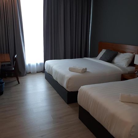 Hotin Inn Kuching Extérieur photo