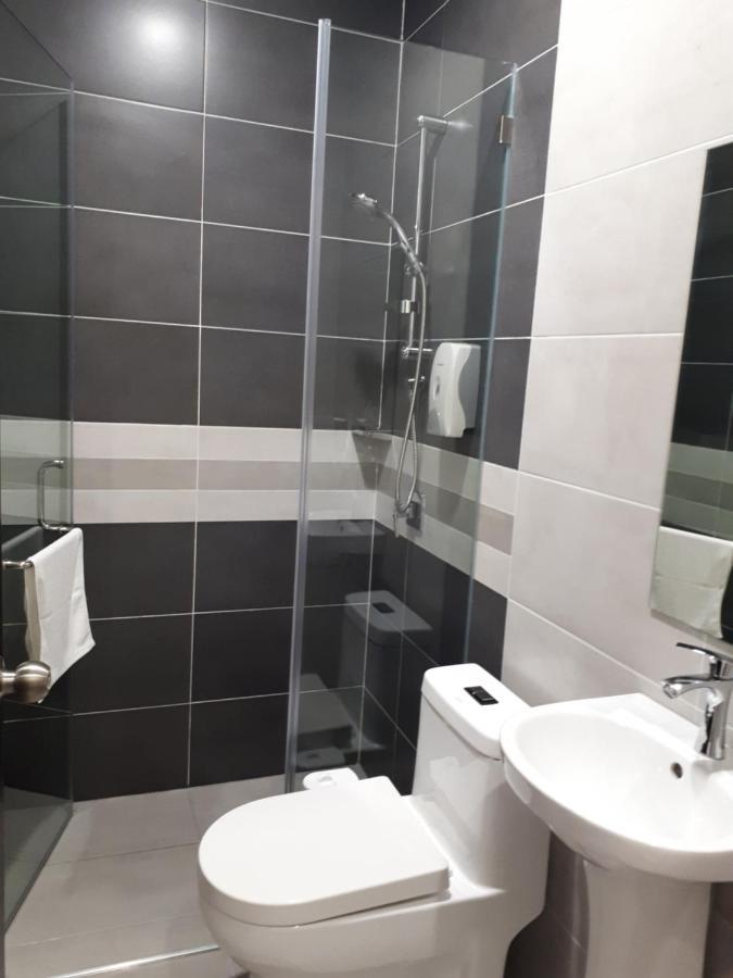 Hotin Inn Kuching Extérieur photo
