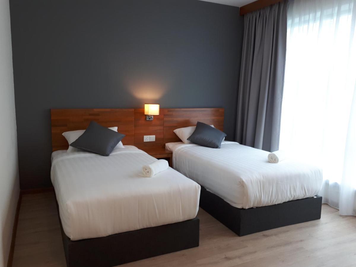 Hotin Inn Kuching Extérieur photo