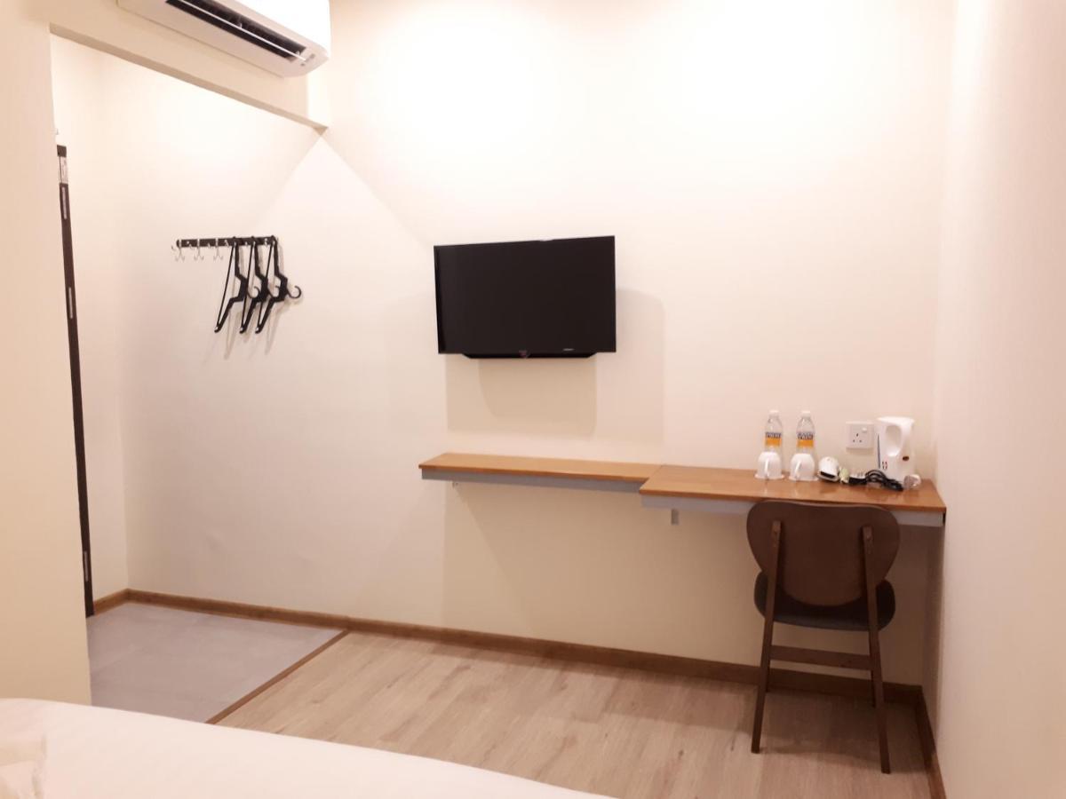 Hotin Inn Kuching Extérieur photo