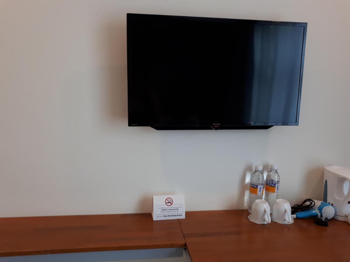 Hotin Inn Kuching Extérieur photo