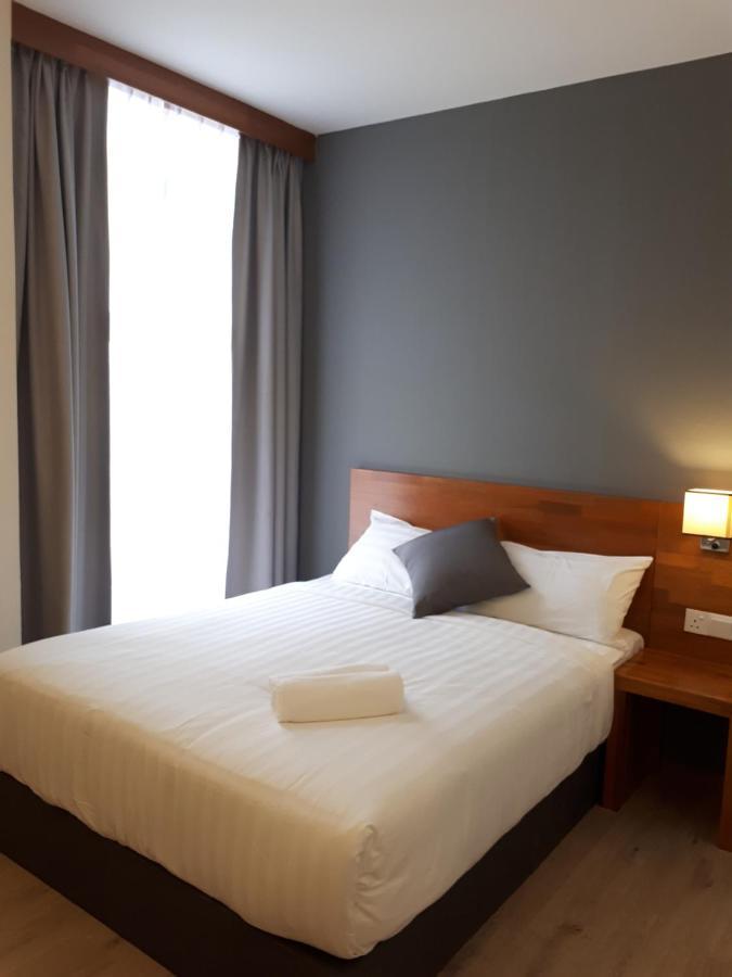 Hotin Inn Kuching Extérieur photo