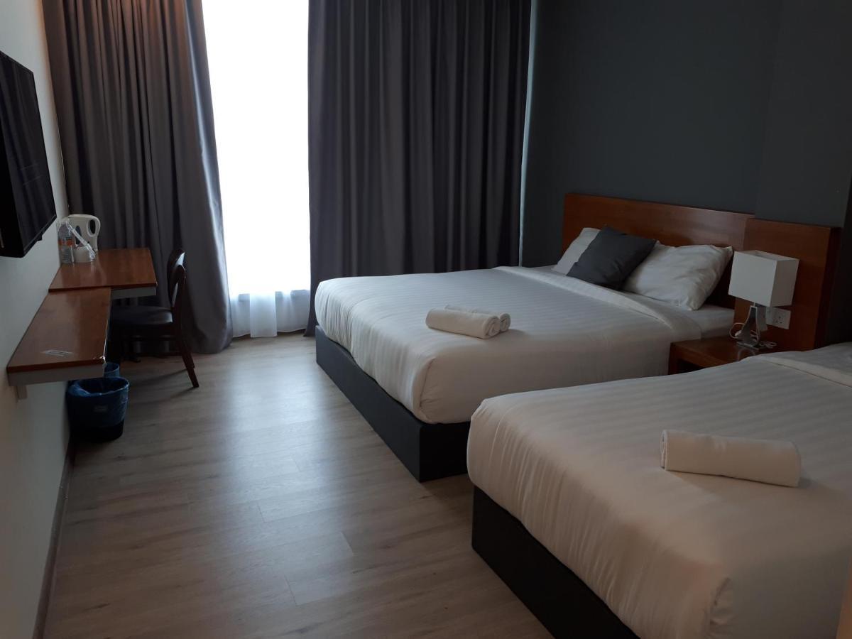 Hotin Inn Kuching Extérieur photo