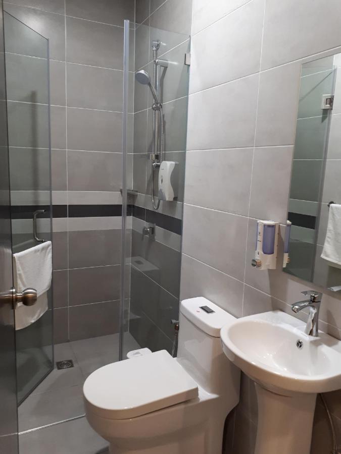 Hotin Inn Kuching Extérieur photo