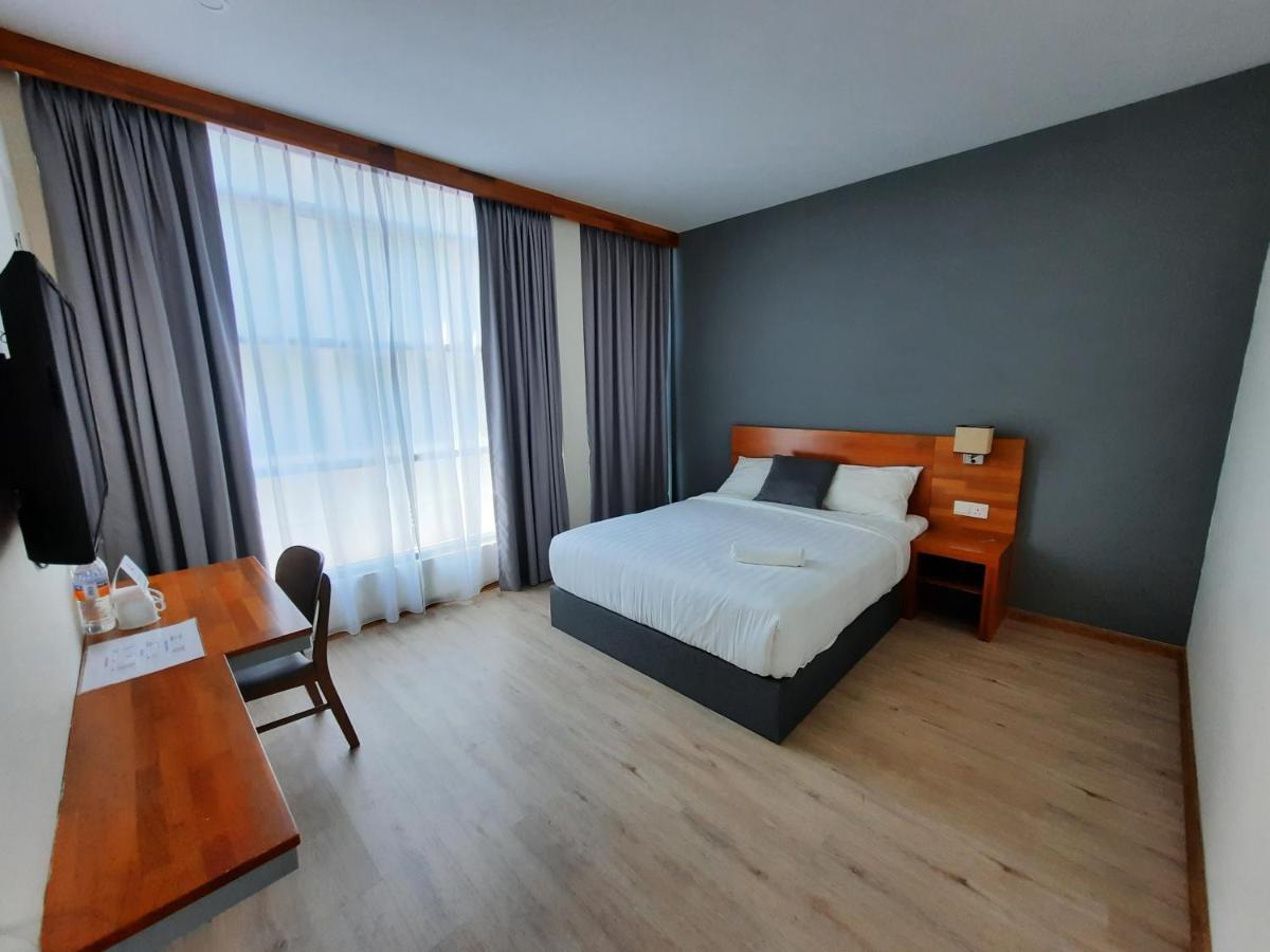 Hotin Inn Kuching Extérieur photo