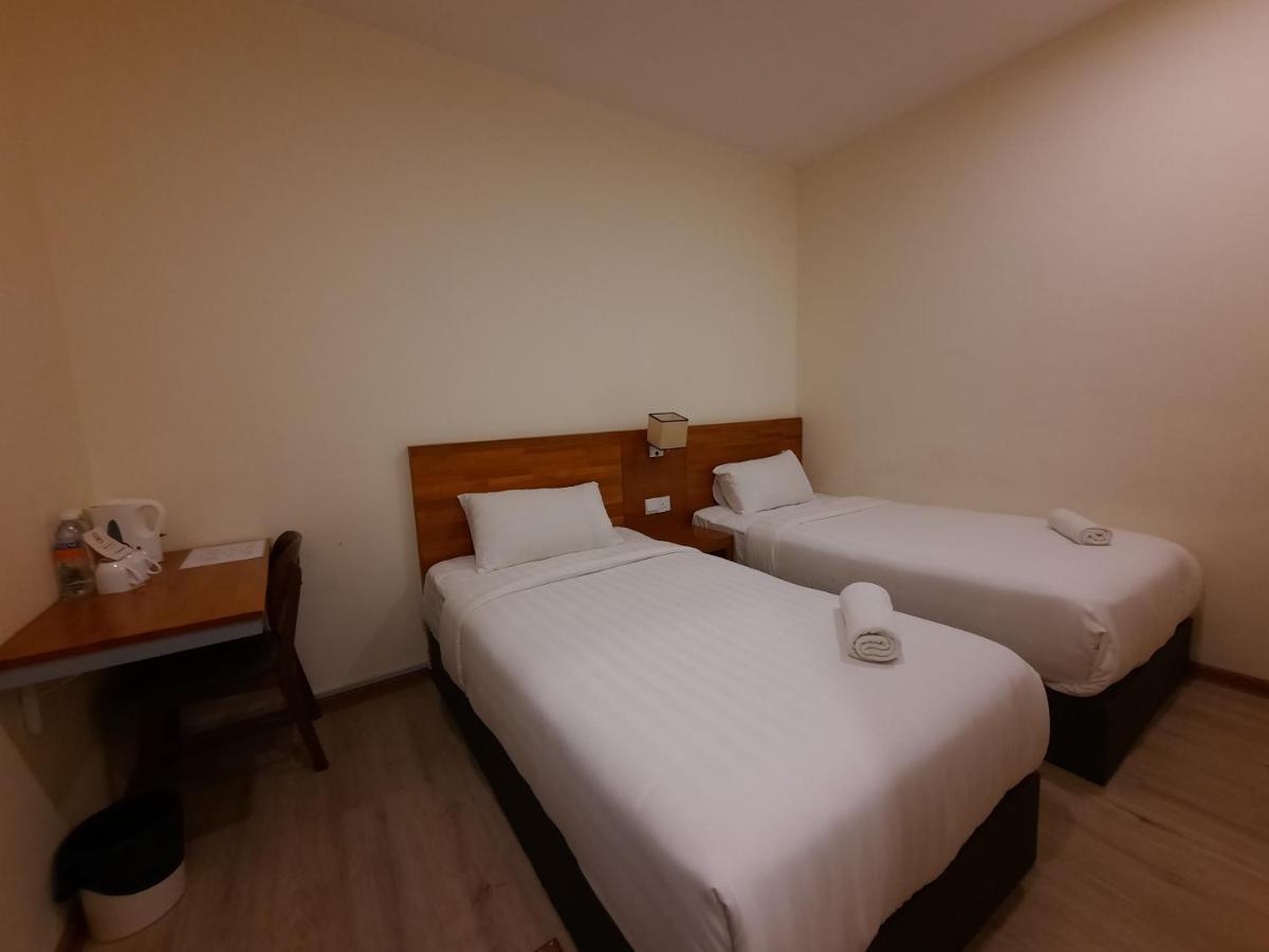 Hotin Inn Kuching Extérieur photo