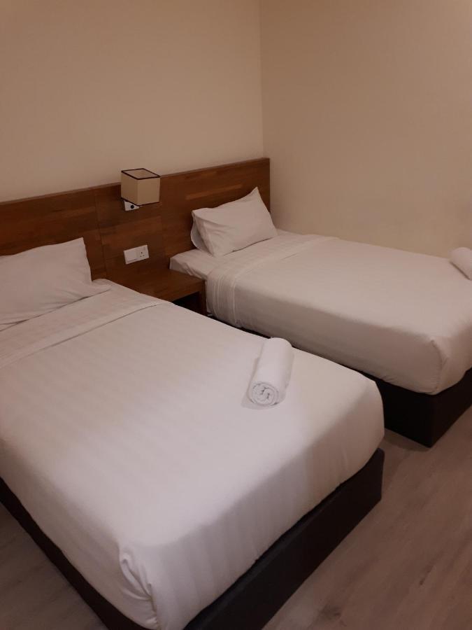 Hotin Inn Kuching Extérieur photo