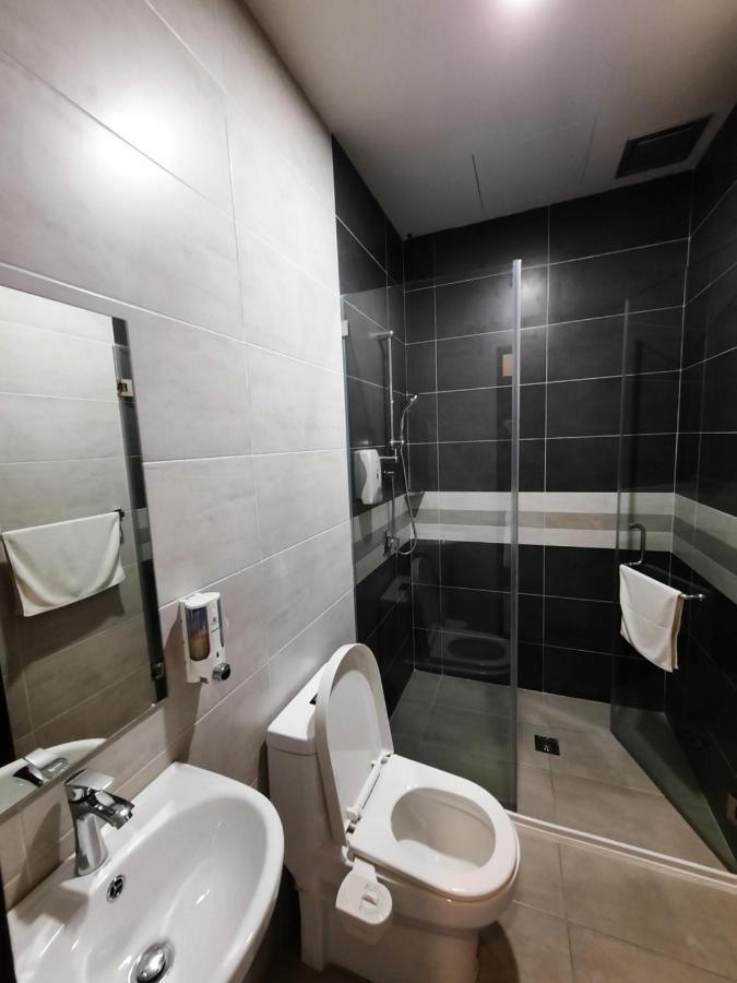 Hotin Inn Kuching Extérieur photo