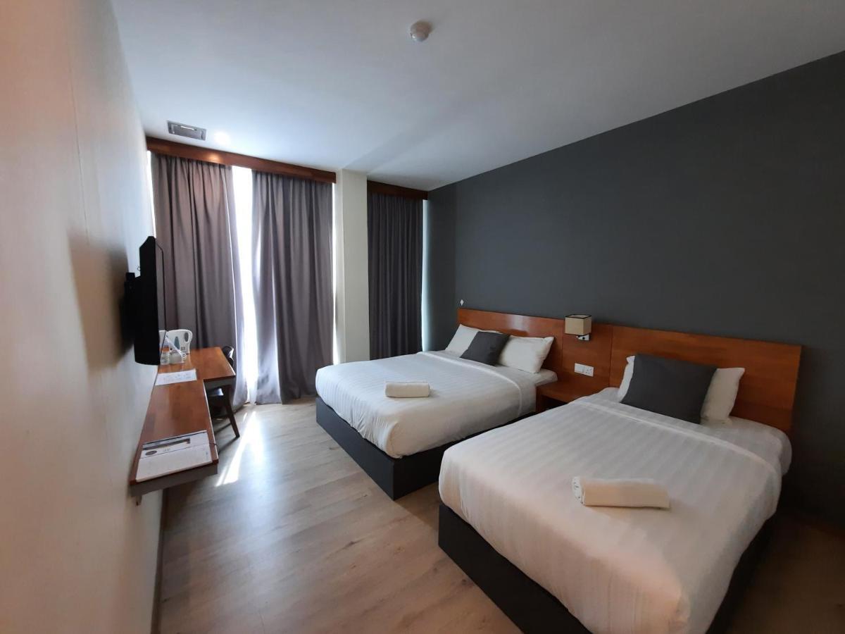 Hotin Inn Kuching Extérieur photo